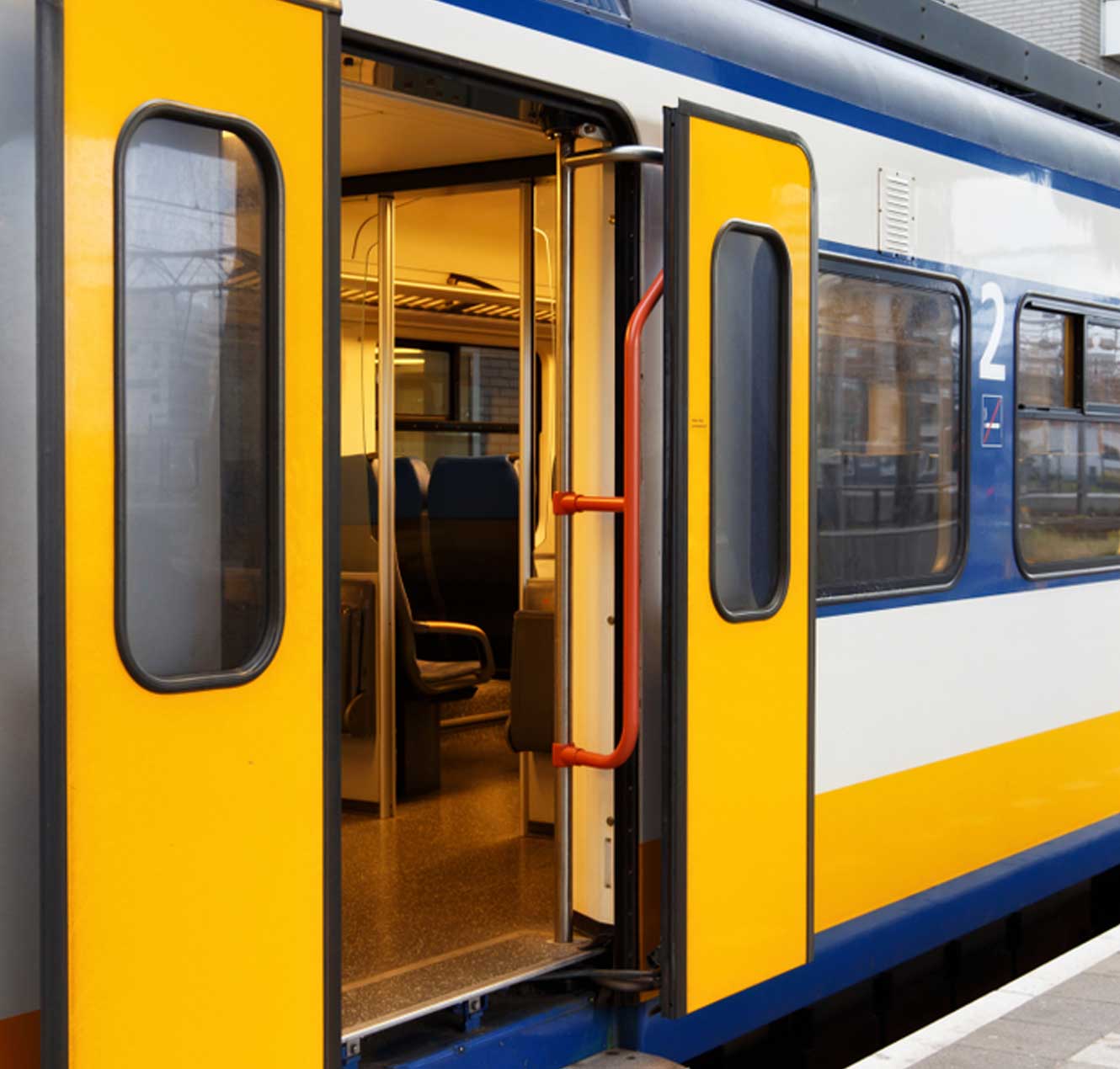 Yellow Train Pulling into the Station